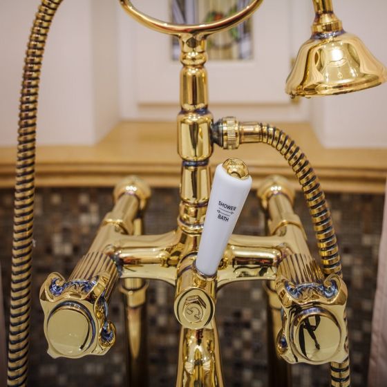 Jörger Design, APHRODITE, classic tap, patinated, 24-carat gold, antique gold, surface-mounted bathtub mixer with hand shower