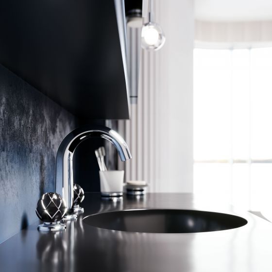 Belledor, washbasin fitting in chrome with black porcelain handles in the shape of a flower with platinum painting in a Neo-Déco bathroom, together with accessories such as a toothbrush tumbler.